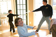Jake and Kris fencing; Lauren